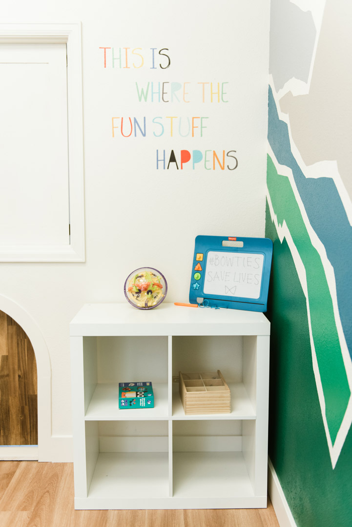 playroom in physical therapy office with word and mountain wall decals