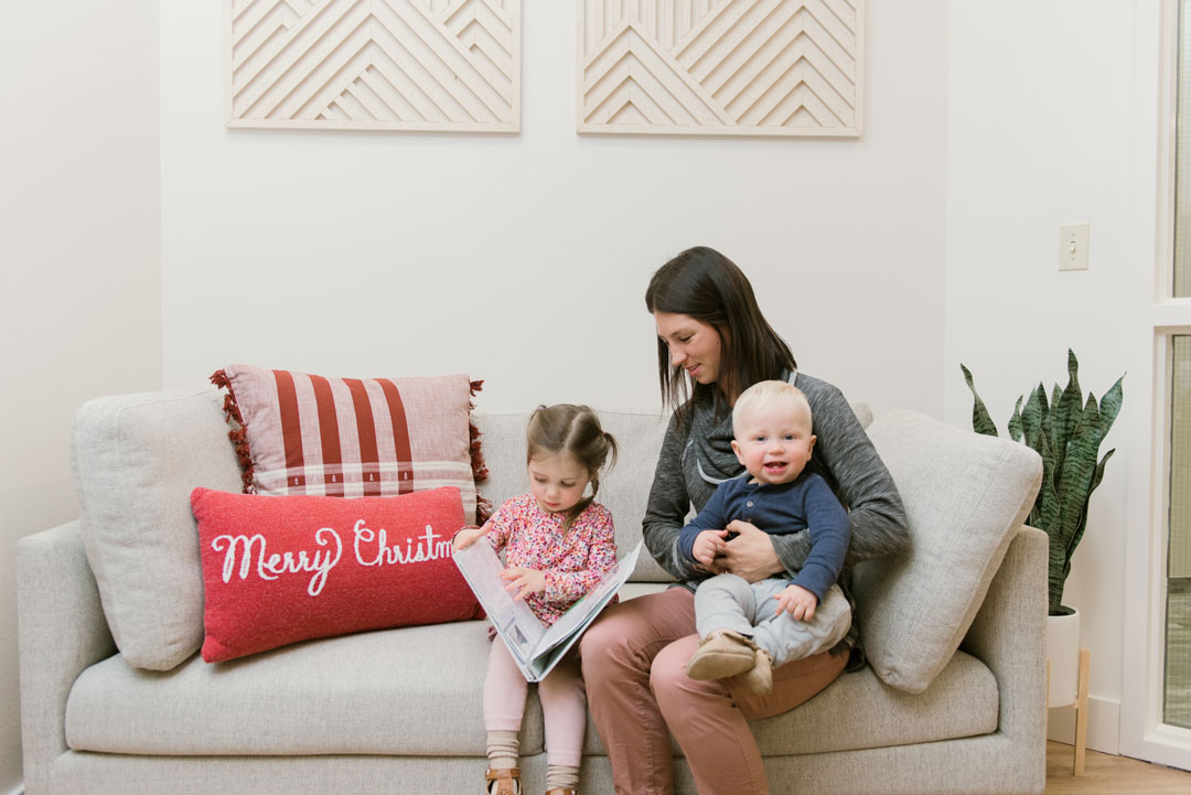 patient with two young children waiting for appointment at physical therapy office during the holidays